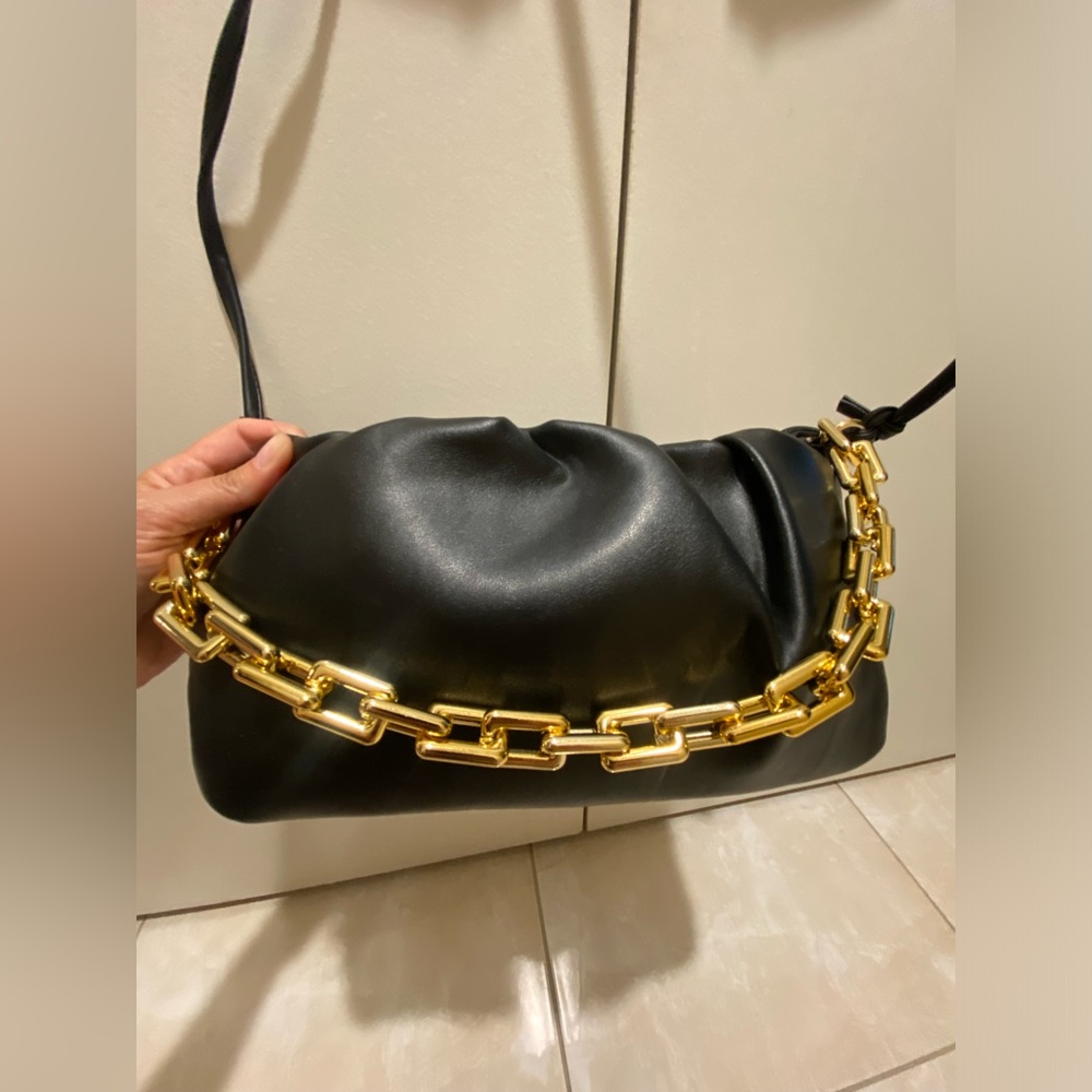 New black bag with gold hardware